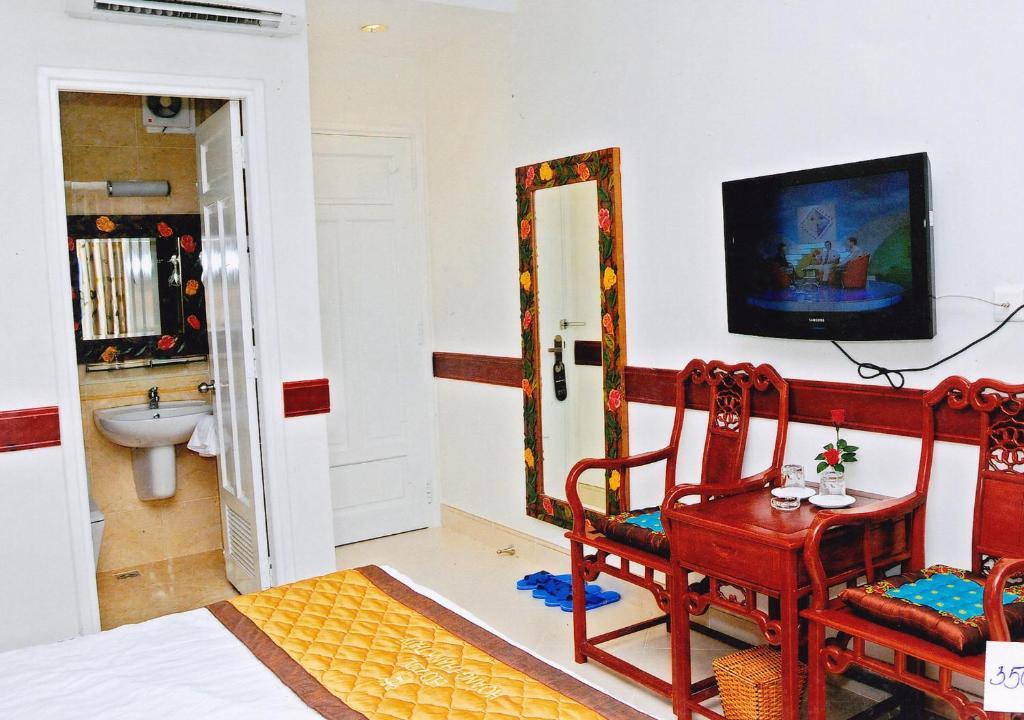 Hoang Thanh Thuy Airport Hotel 1 - Gan Am Thuc Dem Cho Hoang Hoa Tham Ho Chi Minh-staden Rum bild