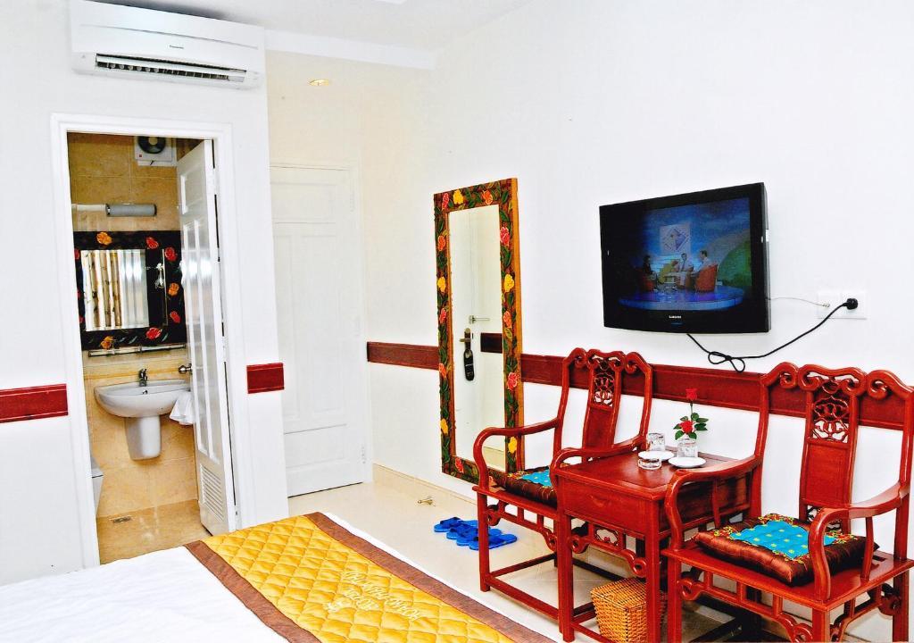 Hoang Thanh Thuy Airport Hotel 1 - Gan Am Thuc Dem Cho Hoang Hoa Tham Ho Chi Minh-staden Rum bild